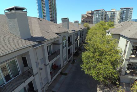 External view of apartment complex showing the roof